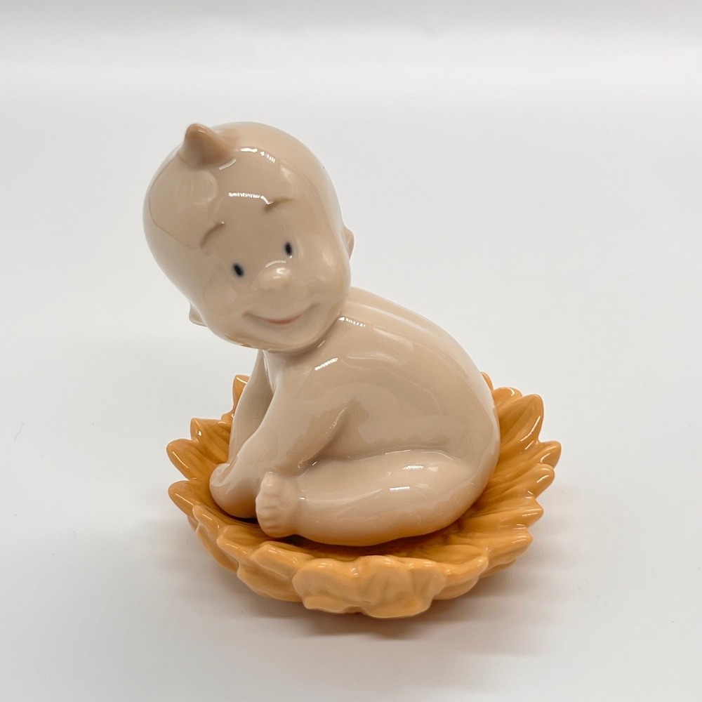 NAO by Lladro From a Sunflower Porcelain Baby Figurine Where Do Babies Come From